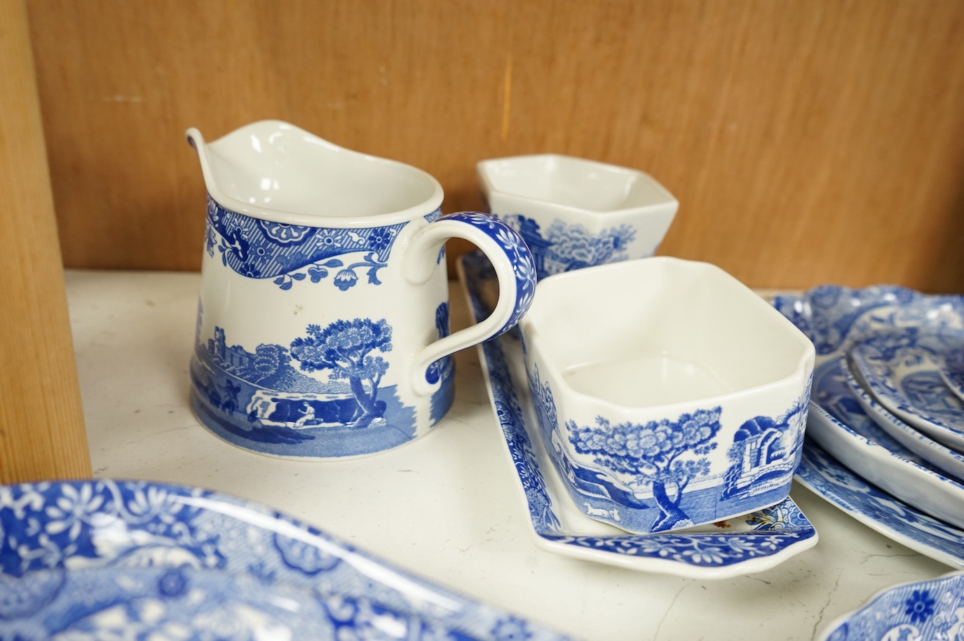 A collection of Spode Italian, comprising graduated jugs, dishes, pickle dishes, pots etc.(23). Largest 20.5cm